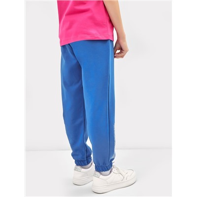 Хлопковые брюки для девочек в синем цвете с принтом