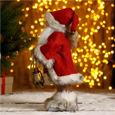 Дед Мороз "В красной шубке, с фонариком и мешочком" 30 см